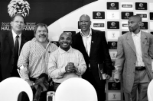 LUMINARIES: Naas Botha, Andy Scott, Jacob Matlala, Butiyi Konki and Oupa Mahlangu at the South African Sport Hall of Fame launch in Sandton , Johannesburg. 04/02/2009. Pic. Mohau Mofokeng. © Sowetan.