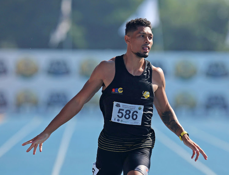 Wayde van Niekerk winning his 200m heat at the South African championships in Pietermaritzburg on Friday morning.