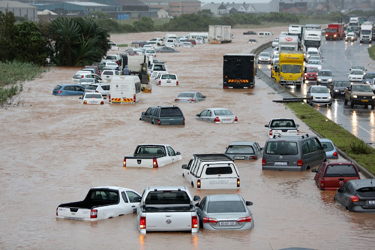 Vehicles stuck in high storm water in Prospecton Road, south of Durban on October 10, 2017.