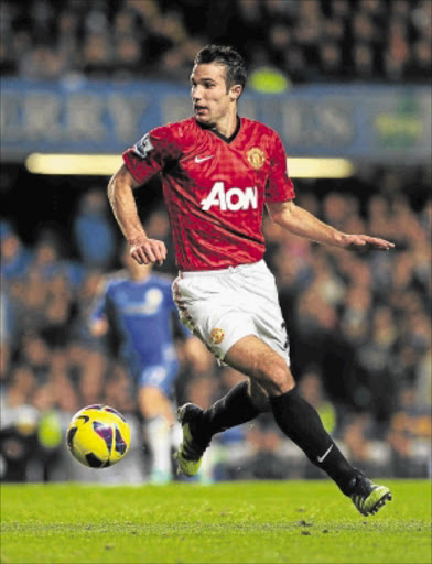 CROSSED OVER : Manchester United striker Robin van Persie Photo: Getty Images