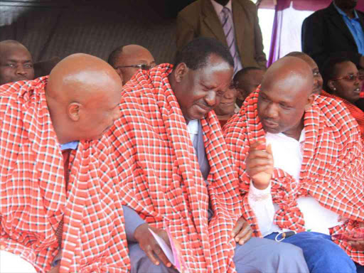 CORD leader Raila Odinga (centre) with Baringo Senator Gideon Moi (left) and Narok Governor Samuel Tunai./FILE