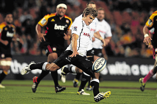 Patrick Lambie of the Sharks takes a drop-kick. His side needs to collect maximum points in all of its remaining matches to have a chance ofmaking the Super 15 play-offs, starting with the Bulls this weekend