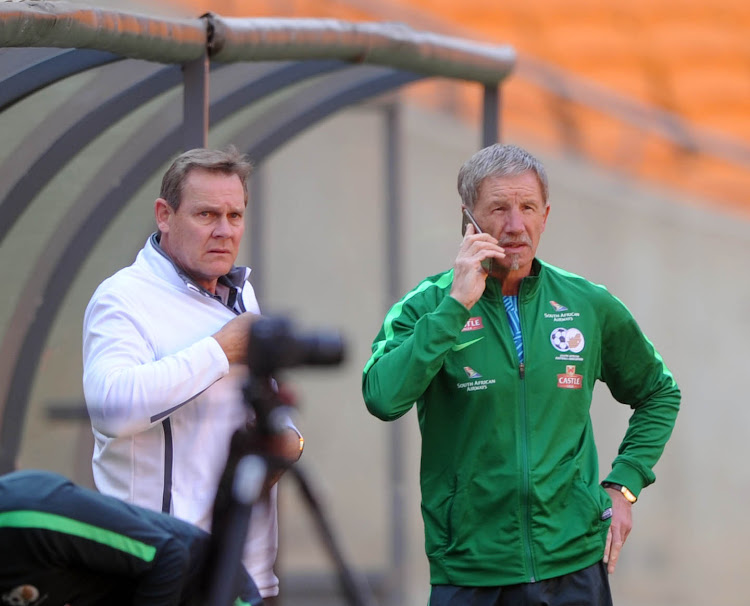 Bafana Bafana coach Stuart Baxter and technical director Neil Tovey in a discussion during the South African national soccer team training session at FNB Stadium on August 16, 2017 in Johannesburg, South Africa.