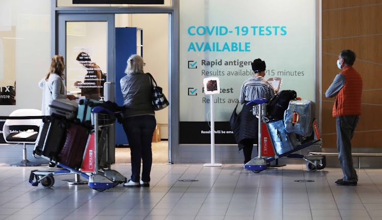 South Africa no longer requires those who test positive for Covid-19 without symptoms to isolate and has also reduced the isolation period for those with symptoms by three days, as the country exits its fourth wave of the coronavirus.