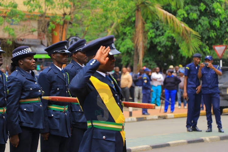 Officers from Nairobi City County inspectorate prepare to receive Governor Johnson Sakaja ahead of his County Assembly address on the status of the county on April 4, 2024
