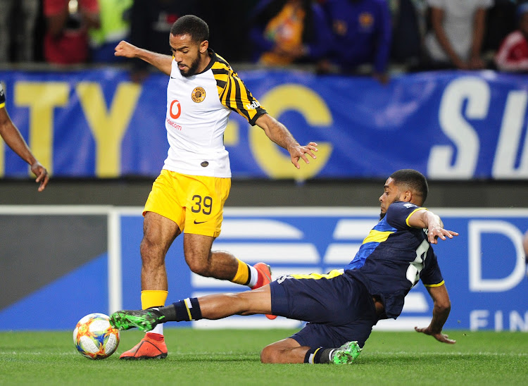 Reeve Frosler of Kaizer Chiefs is tackled by Ebrahim Seedat of Cape Town City.