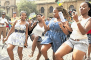 SUPPORT: Millicent Makhubela, Charity Manana, Boitumelo Maneng and Rachel Chabangu  took part in a pro-miniskirt march in  Johannesburg. 
      PHOTO MOHAU MOFOKENG