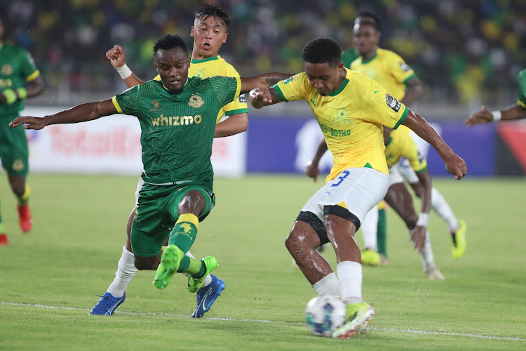 Dickson Nickson Job of Young Africans challenges Lucas Ribeiro of Sundowns during the Caf Champions League quarterfinal, first leg match at Benjamin Mkapa Stadium in Dar Es Salam, Tanzania, on Saturday. Picture: WEAM MOSTAFA/ BACKPAGEPIX