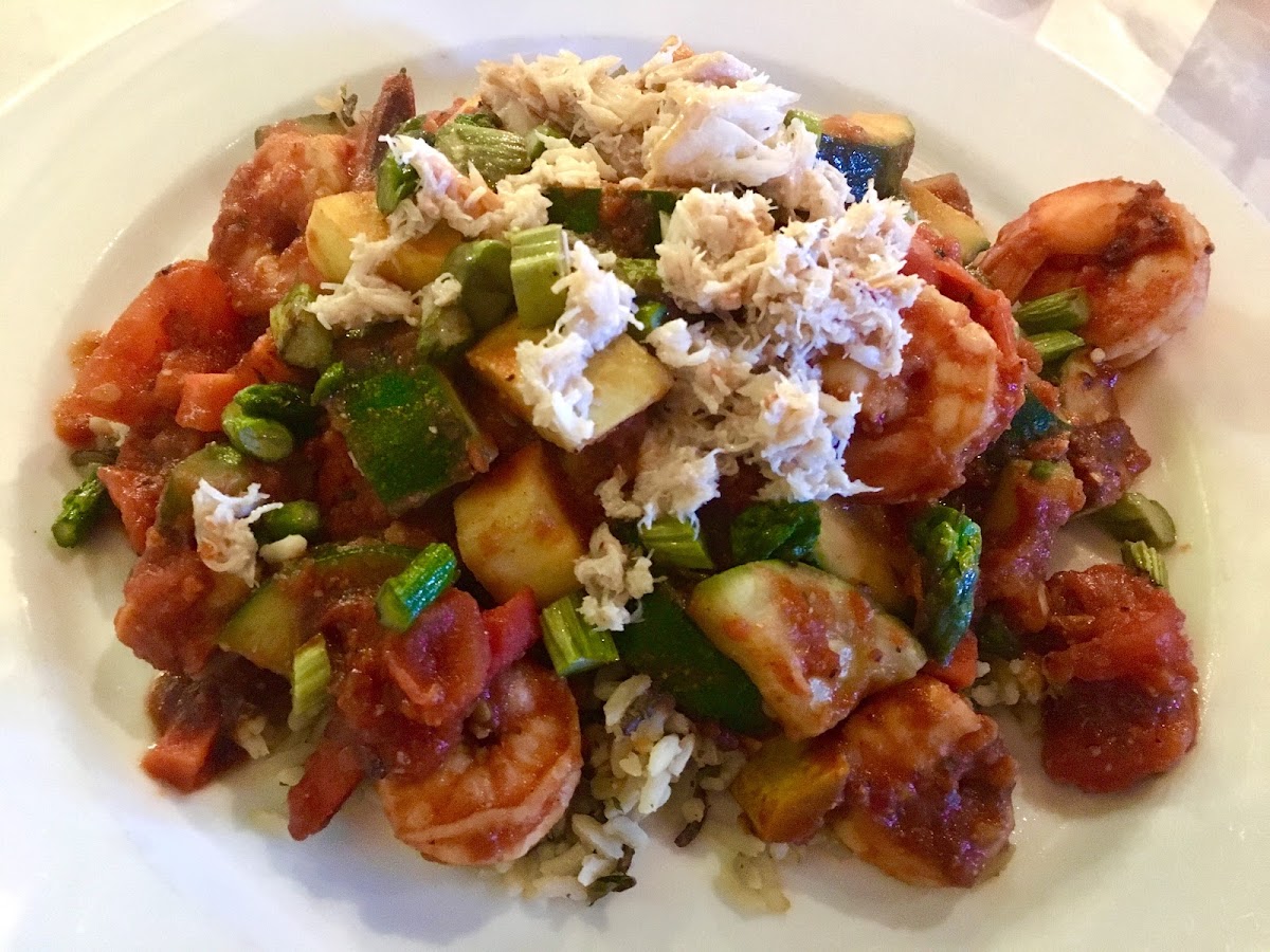 Killer Shrimp Creole
Jumbo shrimp in a hearty vegetable creole sauce. Served over sweet potato dirty rice and topped with an asparagus and lump crab relish.
$23.50