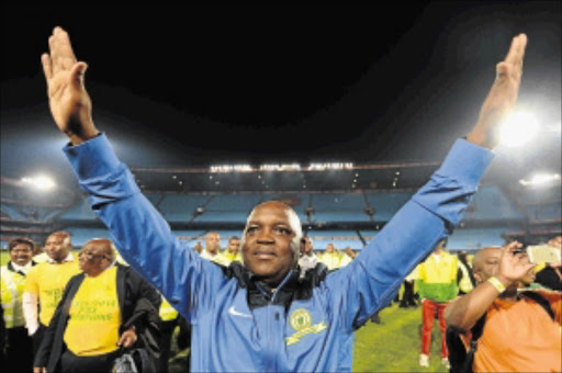 JOB DONE: Pitso Mosimane celebrates winning the Absa Premiership title on Tuesday Photo: Lefty Shivambu/Gallo