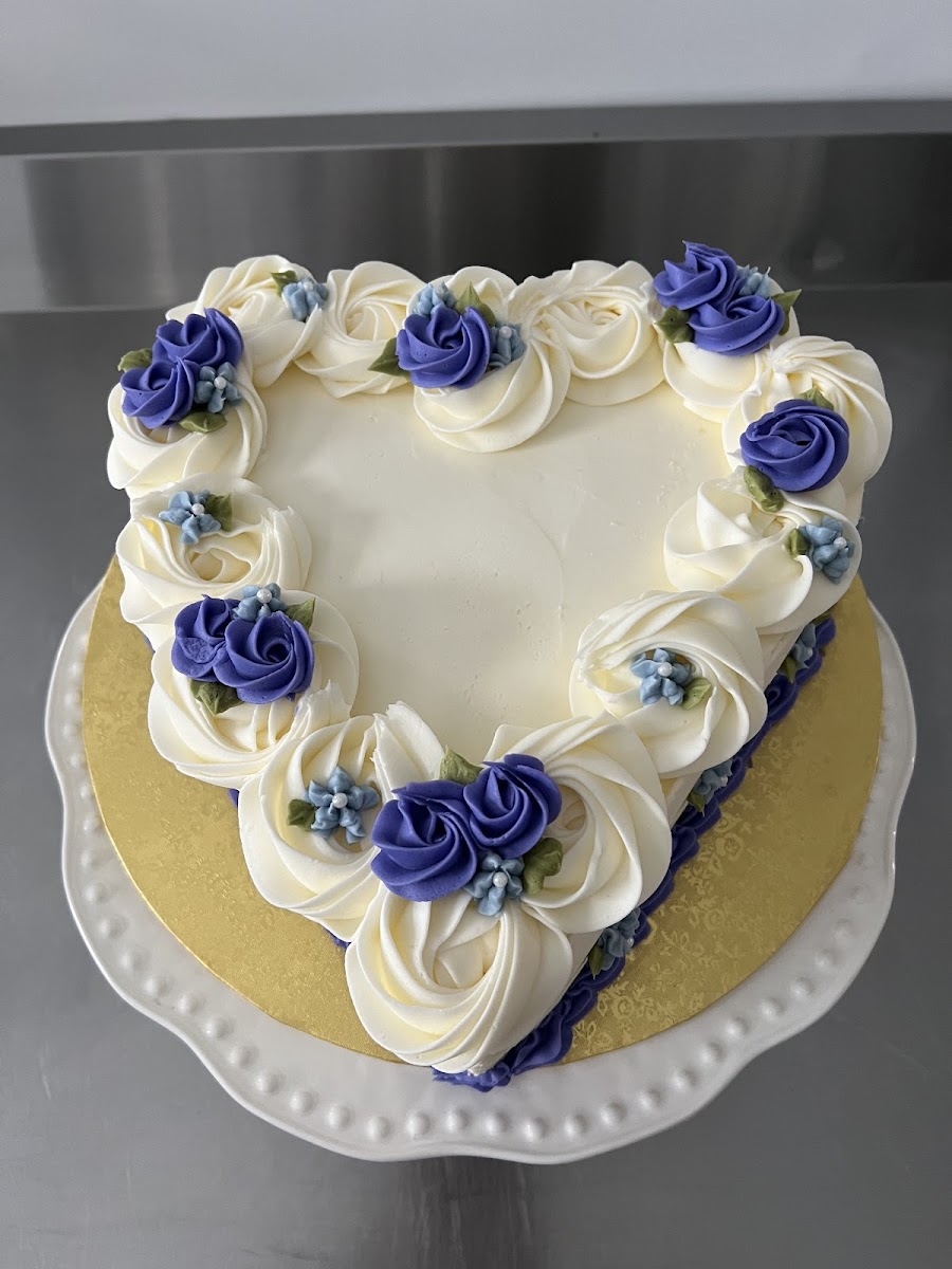GF Vanilla cake with raspberry filling and vanilla buttercream frosting