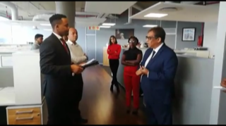 In a screengrab from a video posted on the Business Report website, businessman Iqbal Survé can be seen speaking to an official from the financial regulator at his Cape Town offices on Wednesday morning.