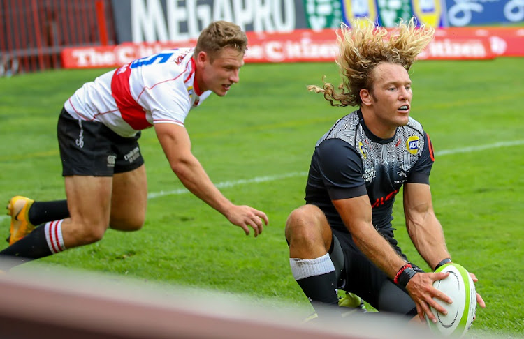 Werner Kok of the Cell C Sharks grabs up the loose ball before Tiaan Swanepoel of the Lions to score his try during the SA Rugby Preparation Series match between Emirates Lions and Cell C Sharks at Emirates Airline Park on March 20, 2021 in Johannesburg, South Africa.