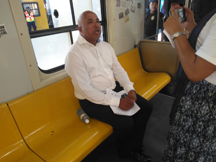 Western Cape head of Metrorail Richard Walker takes a train ride with the rail enforcement unit