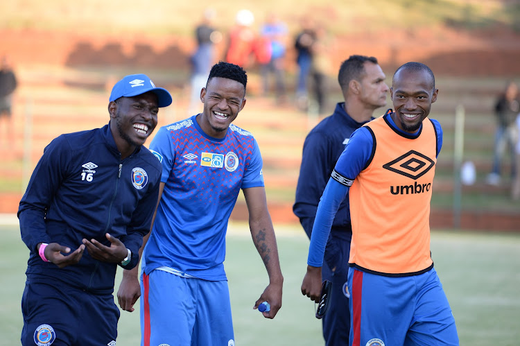 SuperSport United midfielder Aubrey Modiba (L), Sipho Mbule (C) and Thabo Mnyamane share a good laughing moment after their 3-0 MTN8 thrashing of Bidvest Wits.