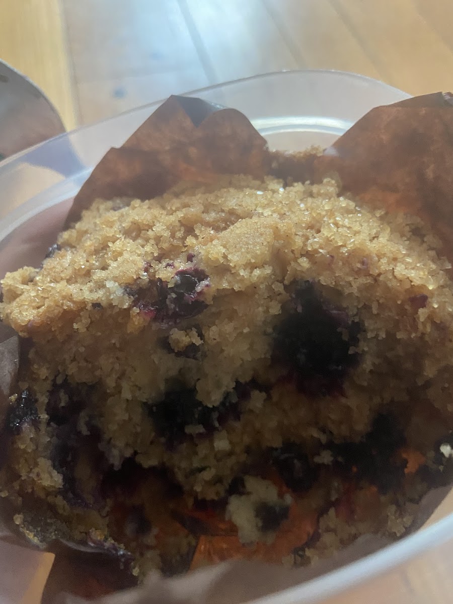 Half eaten blueberry muffin. 10/10