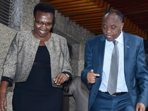 Salaries and Remuneration Commission Chairperson Sarah Serem and Chief of Staff and Head of Public Service with Mr. Joseph Kinyua leave KICC after the release of job evaluation results for public service on Friday.Photo/PSCU