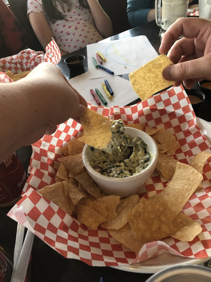 Artichoke dip with chips fried in the separate allergen fryer