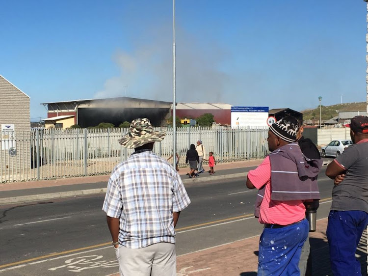 Protests in Hermanus turned fiery over the weekend - as protesters burnt vehicles and a satellite police station.