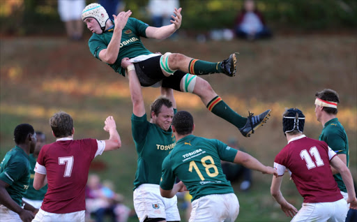 Kenny van Niekerk of Glenwood High School holds up Kevin du Randt of Glenwood High School but with out the ball during the Schools rugby match between Glenwood High School and Kearsney College at Varsity A Field on June 21, 2014 in Durban, South Africa. File photo