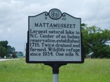 Largest natural lake in N.C. Center of an Indian reservation, established 1715. Twice drained and farmed. Wildlife refuge since 1934. One mile N.Plaque via North Carolina Highway Historical Marker...