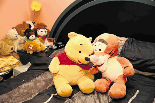 CUDDLES: Winnie-the-Pooh and Tigger hit the right note