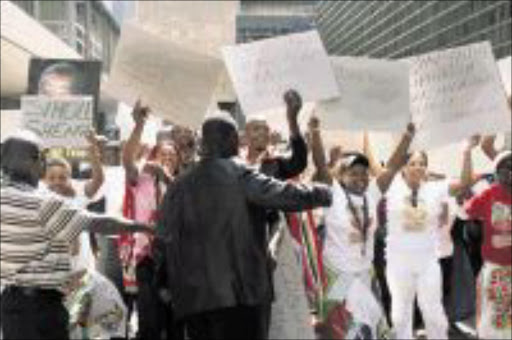 TURMOIL: The IFP's student wing, Sadesmo, and youth brigade members protest outside party's head offices in Durban. Pic. Thuli Dlamini. 01/09/2009. © Sowetan.
