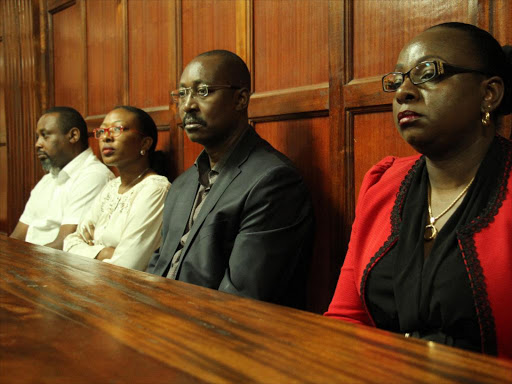 From left to right: Mukuria Ngamau, Doreen Waithera, suspended Youth Enterprise Development Fund Chairman Bruce Odhiambo and CEO Catherine Namuye at Milimani law courts, August 26, 2016 /PHILIP KAMAKYA