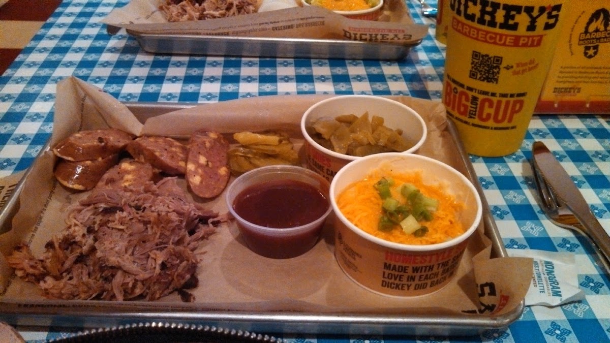 pulled pork, spicy cheesy sausages, green beans, and loaded mashed potatoes. yum