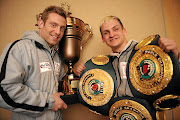 Trainer Colin Nathan, left, and his charge Hekkie Budler, whose  loss to Hiroyoto Kyoguchi ended his reign as the WBA Super and the Ring Magazine junior-flyweight holder . / Tsheko Kabasia