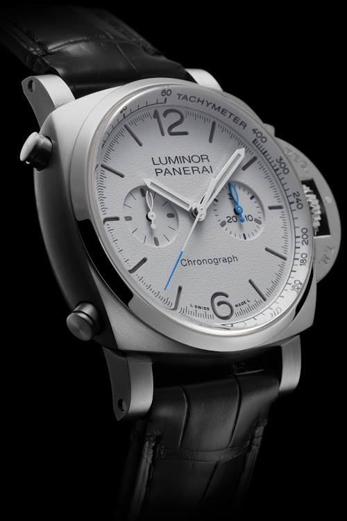 The crown-protection bridge on the right-hand side of the dial is a signature design detail of Panerai Luminor timepieces, including the Luminor Chrono PAM01218.
