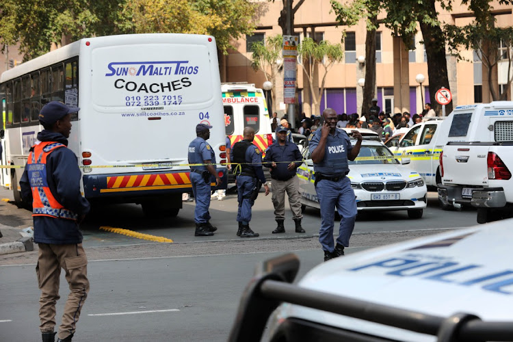 Police officers responded to the Braamfontein shooting scene where a UJ student and two others were hit by a stray bullet during a shootout on 29 February.
