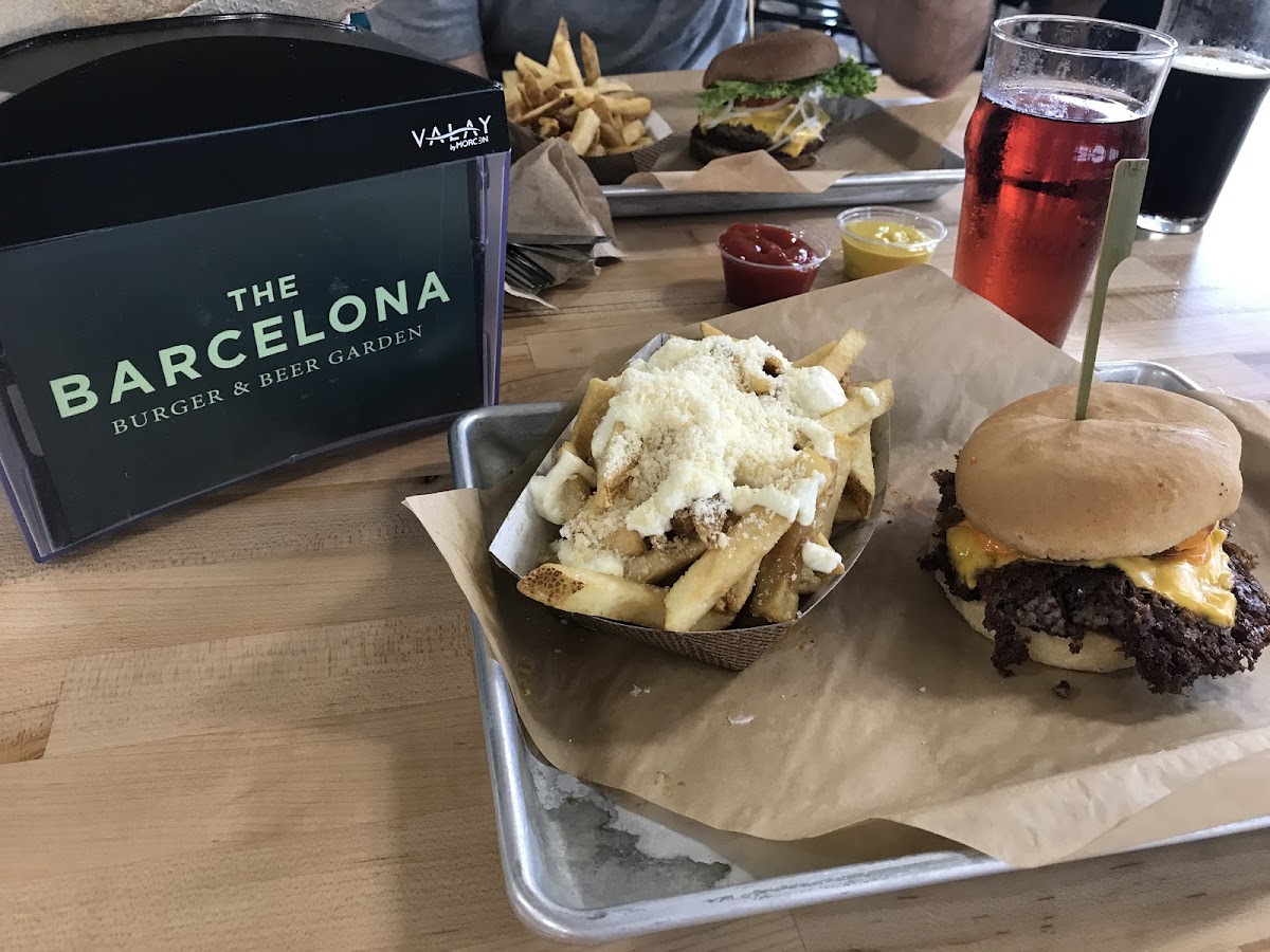 This is the Madrid burger on GF bun with truffle fries. Please note, there is cross contamination for the fries.