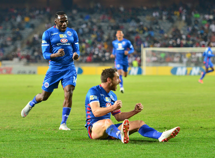 SuperSport United captain Dean Furman celebrates with teammate Onismor Bhasera during the MTN8 quarter final match against Orlando Pirates and at Orlando Stadium, Johannesburg on August 11 2018.