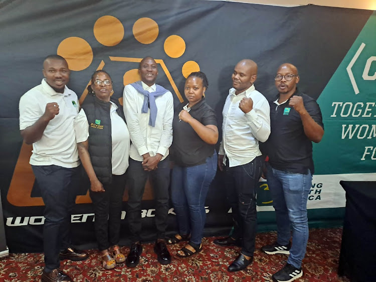 Mncedisi Ngqumba, second from left, and Lehlohonolo Ramagole in glasses during the launch of Women in Boxing Series in Kimberly. Promoters want to know how this tournament was authorised.