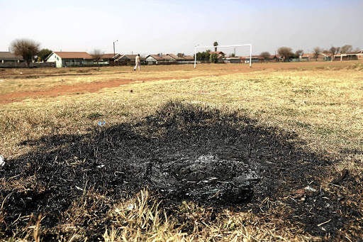 The scene where an 18-year-old man survived necklacing by a mob in Daveyton, East Rand. /Alaister Russell
