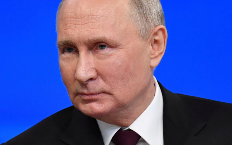 FILE PHOTO: Russian President Vladimir Putin. Sputnik/Alexander Kazakov/Pool via REUTERS