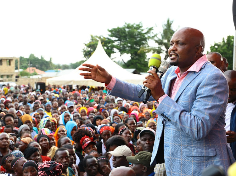 Gatundu South MP Moses Kuria addressing Jomvu residents in Mombasa County on July 13, 2019 during the Wanjiku campaign trail.