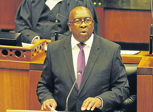 TOUGH MEASURES: Finance Minister Nhlanhla Nene is going to have to cut his coat according to his cloth when he tables his medium-term budget policy statement in parliament next week Picture: GALLO IMAGES
