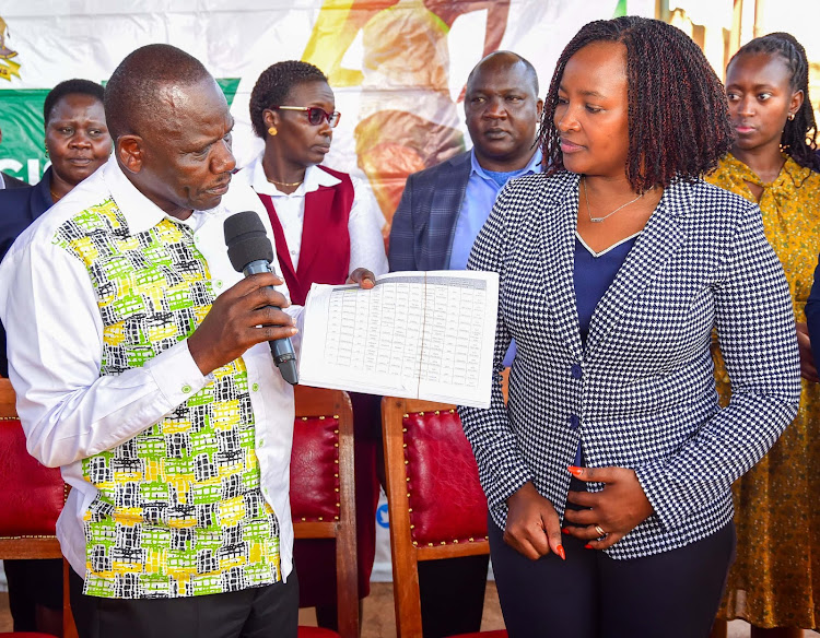 Uasin GIshu Governor Jonathan Bii with Principal Secretary for Devolution Teresia Mbaika during the handing over of 158 vehicles to the county government in Eldoret on April 30, 2024