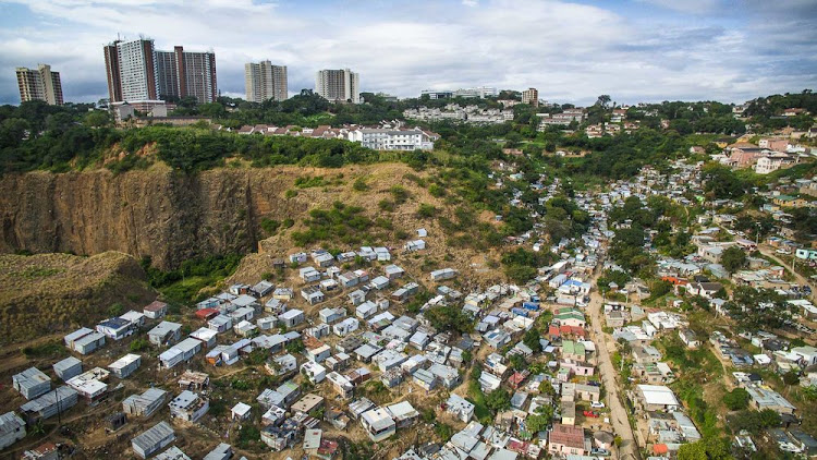 Johnny Miller says: 'Morningside is one of Durban’s richest suburbs, and for good reason. The location is spectacular. High-rise apartment buildings tower over cliffs above the Umgeni River, with beautiful views of the spectacular Moses Madiba soccer stadium, Durban Country Club and Indian Ocean.'