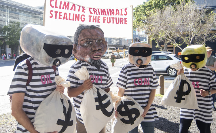 Climate activists protest at African Energy Week outside the Cape Town International Convention Centre on October 17 2023.