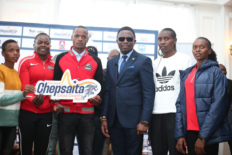 From (L-R ) Beatrace Chebet,Mary Moraa,Vincent Keter,CS Sports Ababu Namwamba,Agnes Chebet and Sheilah Chelegat during the launch of The Great Chepsaita Cross Country on November 22,2023