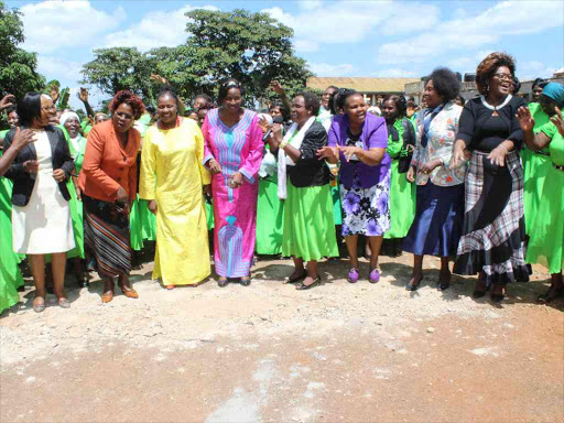 Kenya Women Parliamentarians Association (Kewopa) MPs dance with women at Ruchu Catholic Church/ FILE