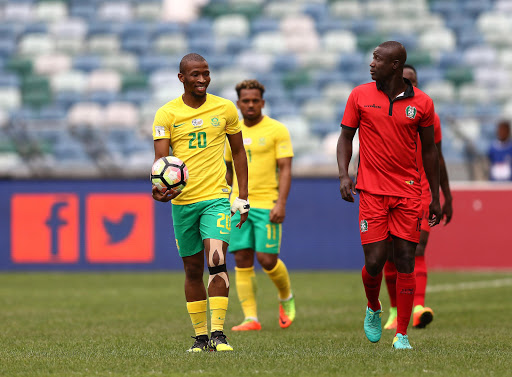 Kamohelo Mokotjo (L) during the International friendly match between South Africa and Guinea-Bissau at Moses Mabhida Stadium on March 25, 2017 in Durban, South Africa.