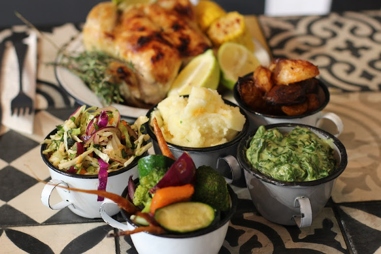 The Chicken Shop offers an array of tempting hot sides and colourful salads.