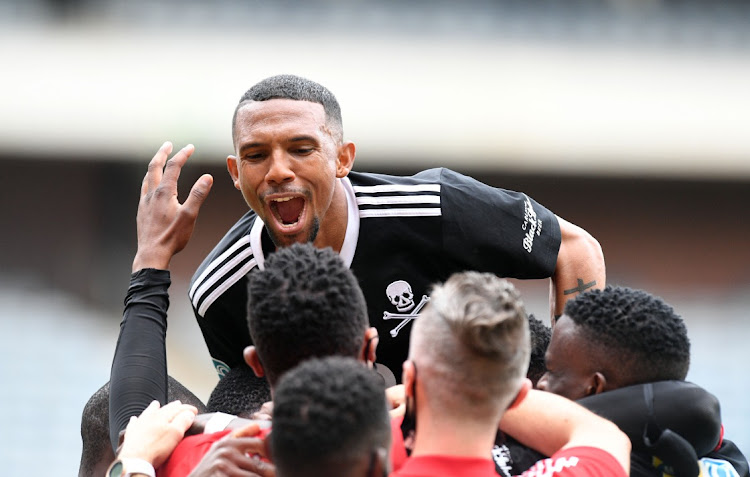 Vincent Pule of Orlando Pirates celebrates scoring a goal with teammates during the 1st Leg of the MTN8 Semi Final match between Orlando Pirates and Kaizer Chiefs.