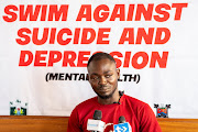 Akinrodoye Samuel addresses the press ahead of his ambitious attempt to swim the 11.8km stretch of the Third Mainland Bridge, advocating for the theme 'Swim Against Suicide And Depression' in Lagos, Nigeria, on March 30 2024.