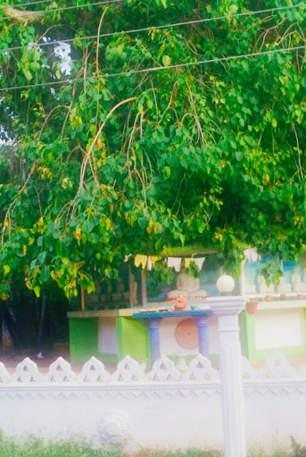 Buddha statues with decorated walls