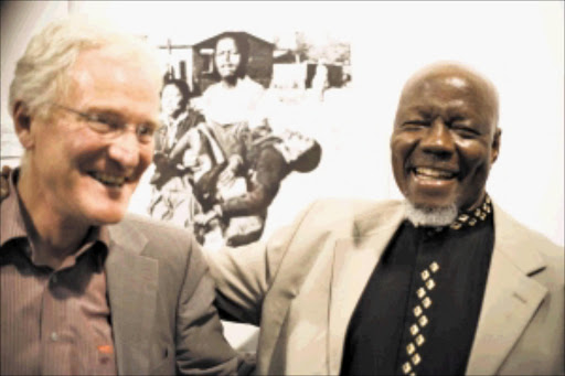 PARTNERS: Hector Pieterson Schule principal Dietmar Pagel with famous photographer Sam Nzima at the Berlin photo exhibition. 03/06/2010. © Sowetan.